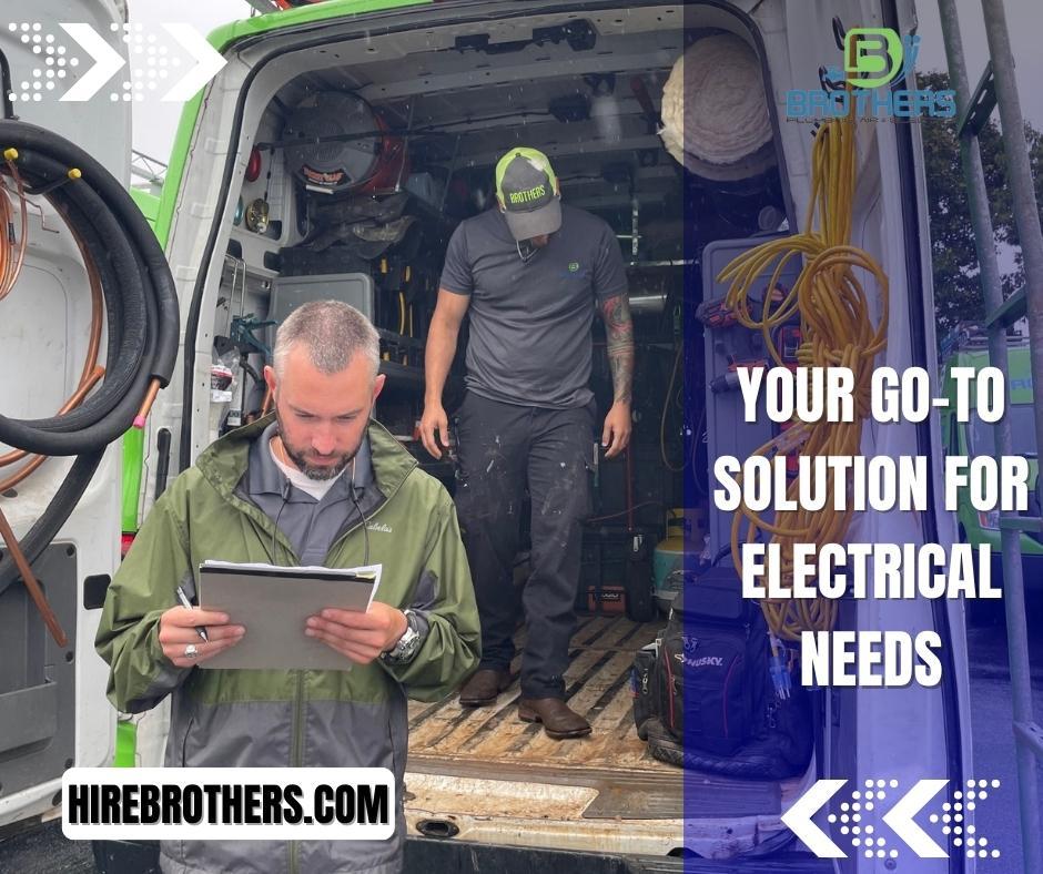 An Electrician standing in the back of a Brothers Plumbing, Air, & Electric's van